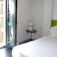 Escapadinha hotel ao lado da Plaza Mayor no quarto com varanda