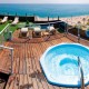 Descubra Calella com meia pensão e spa num hotel à beira-mar