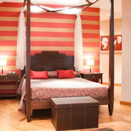 Escapadela romântica em suite com banheira de hidromassagem no quarto e champanhe em Baeza