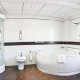 Escapadela romântica em suite com banheira de hidromassagem no quarto e champanhe em Baeza