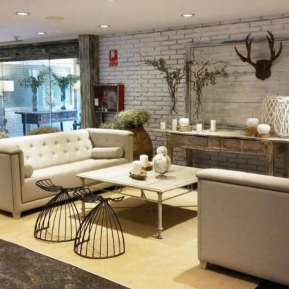 Discover Pamplona in a rustic-style building with breakfast and spa access included