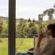 Romantic getaway in idyllic surroundings with glass of cava and chocolates