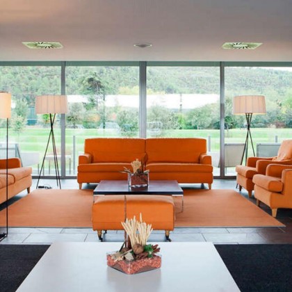 Romantic getaway in idyllic surroundings with glass of cava and chocolates