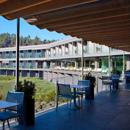 Romantic getaway in idyllic surroundings with glass of cava and chocolates