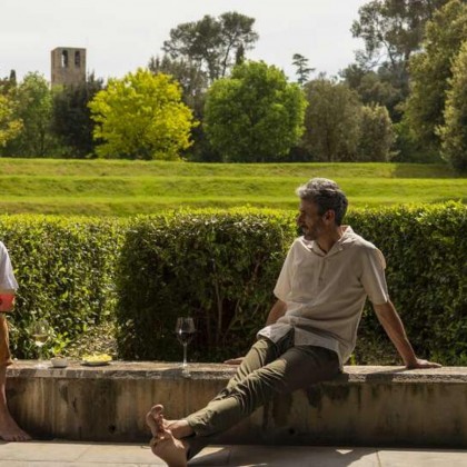Romantic getaway in idyllic surroundings with glass of cava and chocolates