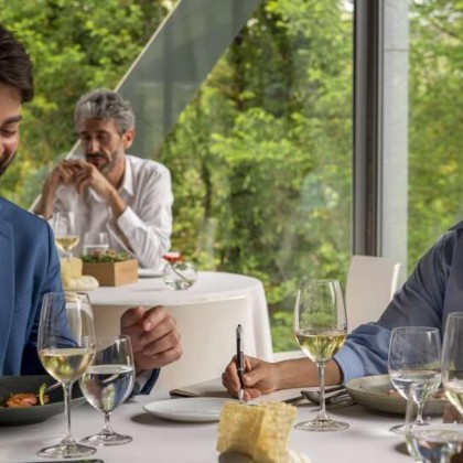 Romantic getaway in idyllic surroundings with glass of cava and chocolates