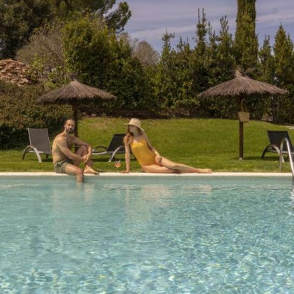Romantic getaway in idyllic surroundings with glass of cava and chocolates