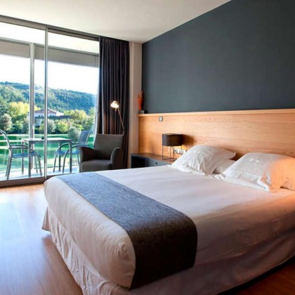 Romantic getaway in idyllic surroundings with glass of cava and chocolates