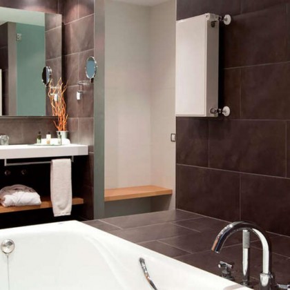 Romantic getaway in idyllic surroundings with glass of cava and chocolates