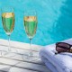 Romantic getaway in idyllic surroundings with glass of cava and chocolates